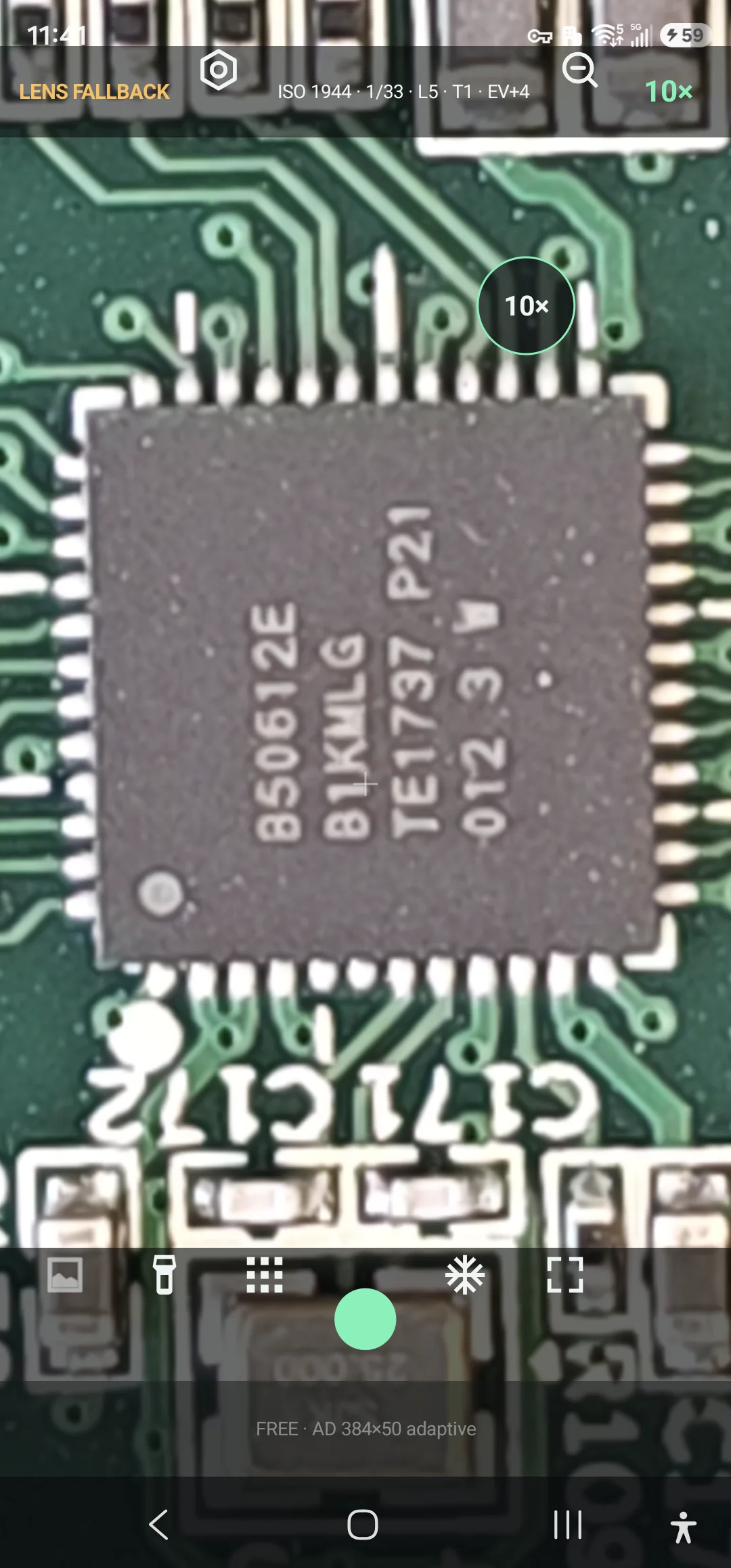 Real pinned integrated circuit inspected at the hardware-backed 10 times step on a compatible Samsung Galaxy S23 Ultra