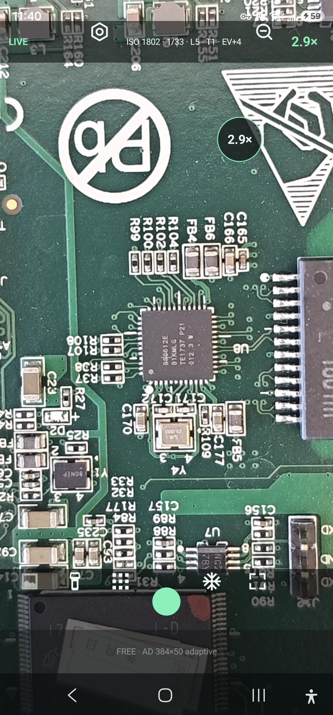 Real PCB and pinned integrated circuit inspected at 2.9 times magnification